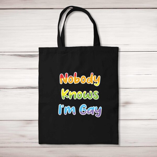 Nobody Knows I'm Gay - Rude Tote Bags - Slightly Disturbed - Image 1 of 5